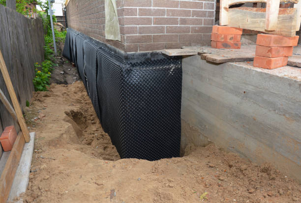 Happy homeowners after waterproofing job in Des Plaines